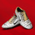 Wayne Rooney pair of gold, white and black Nike total T90 III autographed football boots