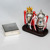 Two miniature trophies commemorating Arsenal's Double winning 2001/2 season