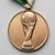 An Italia 1990 3rd/4th Place bronze medal