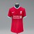 Liverpool 2020-21 season replica shirt signed by the squad